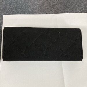 Woman’s Chanel quilted eye glass case.   With cleaning cloth and Chanel box